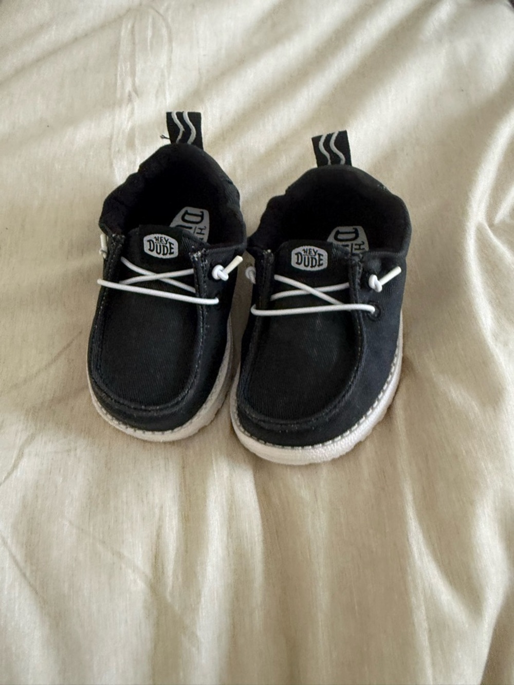 Hey Dude Kids Black Canvas Slip-On Sneakers with White Laces